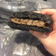 Illustration for article titled Burger King's all-black burger looks absolutely disgusting in real life
